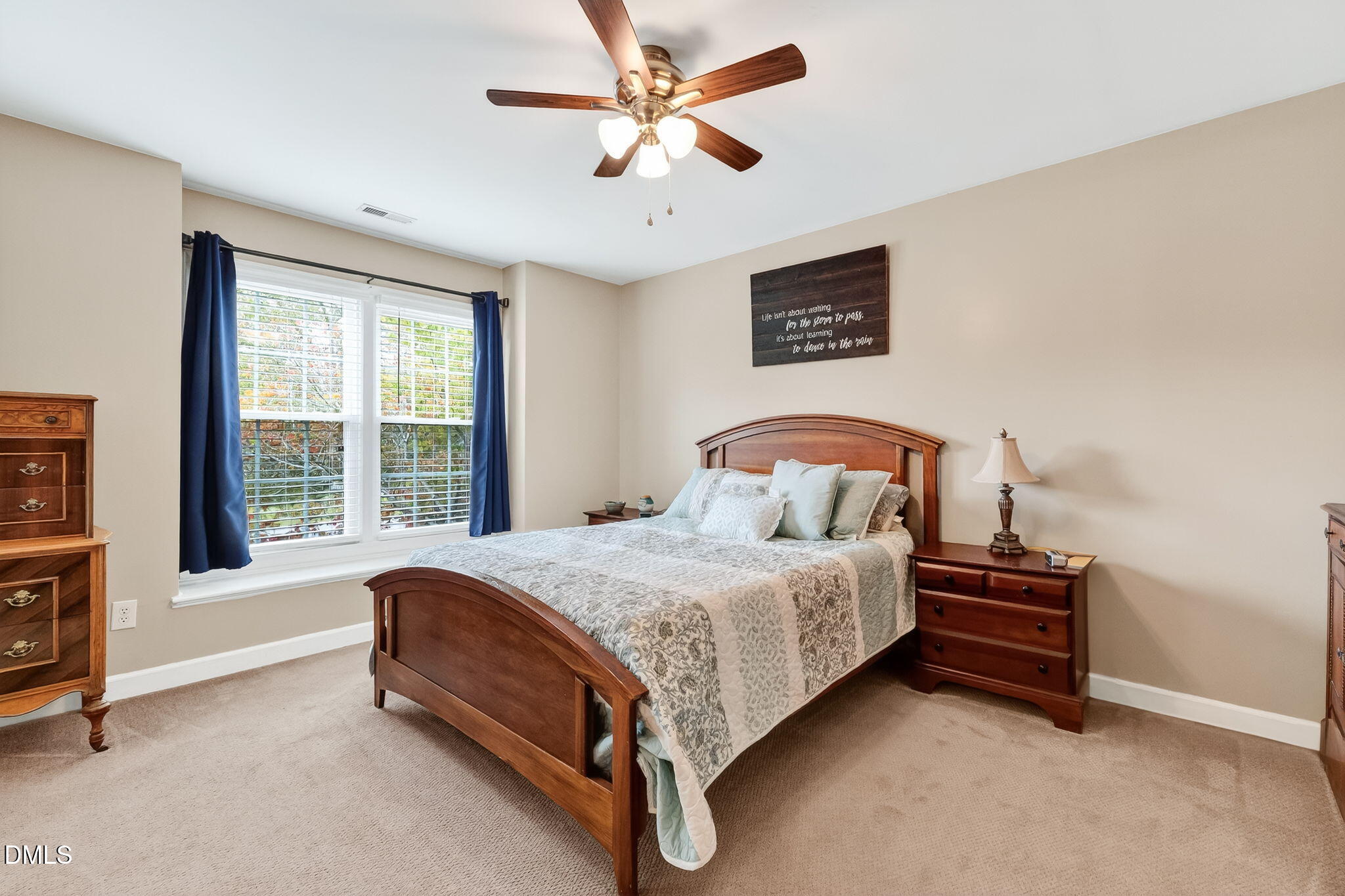 6009 Swales Way Raleigh, NC 27603 - Photo 40 of 59 a bedroom with a bed and a window