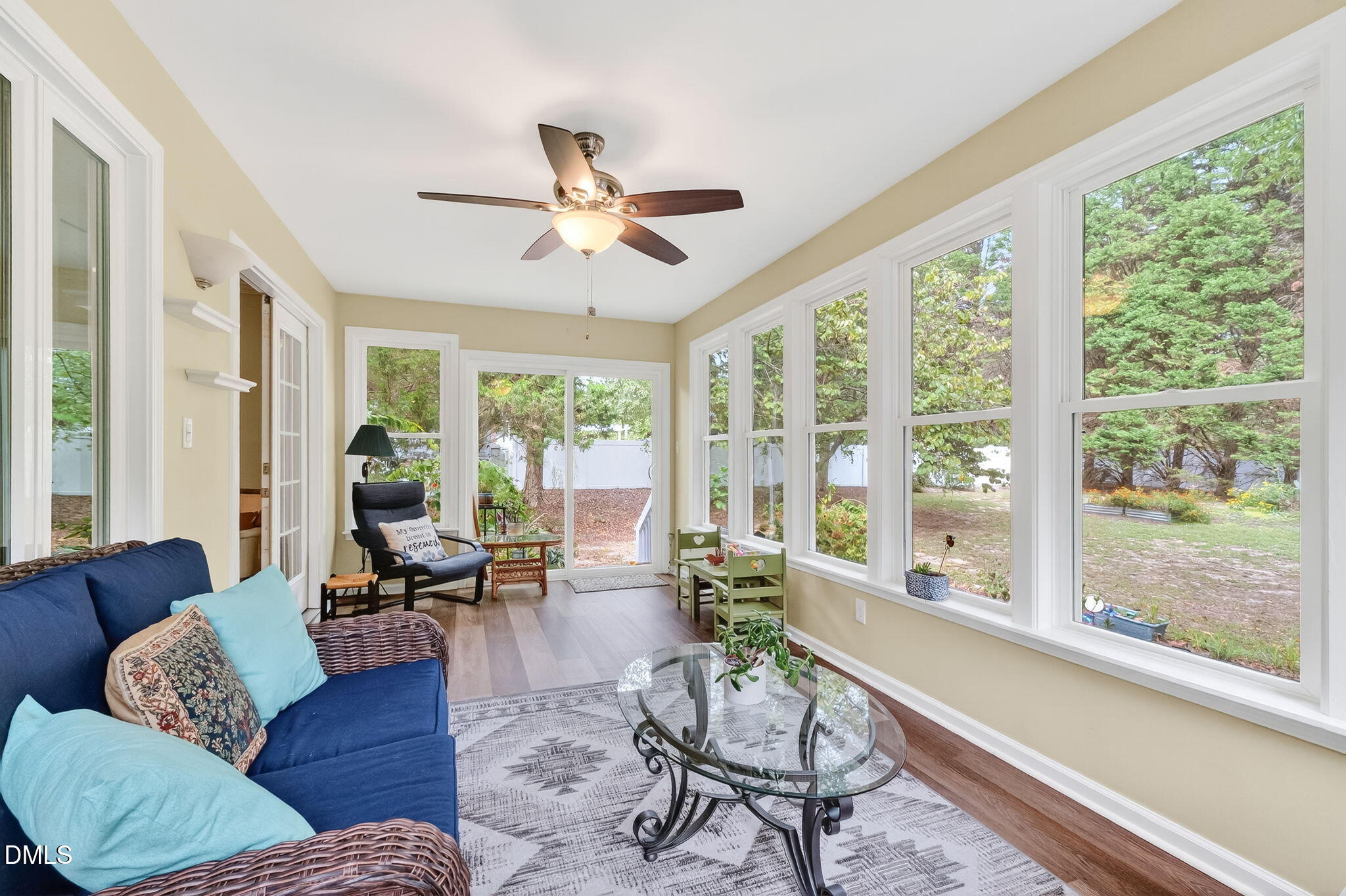 6009 Swales Way Raleigh, NC 27603 - Photo 50 of 59 a living room with furniture and a large window