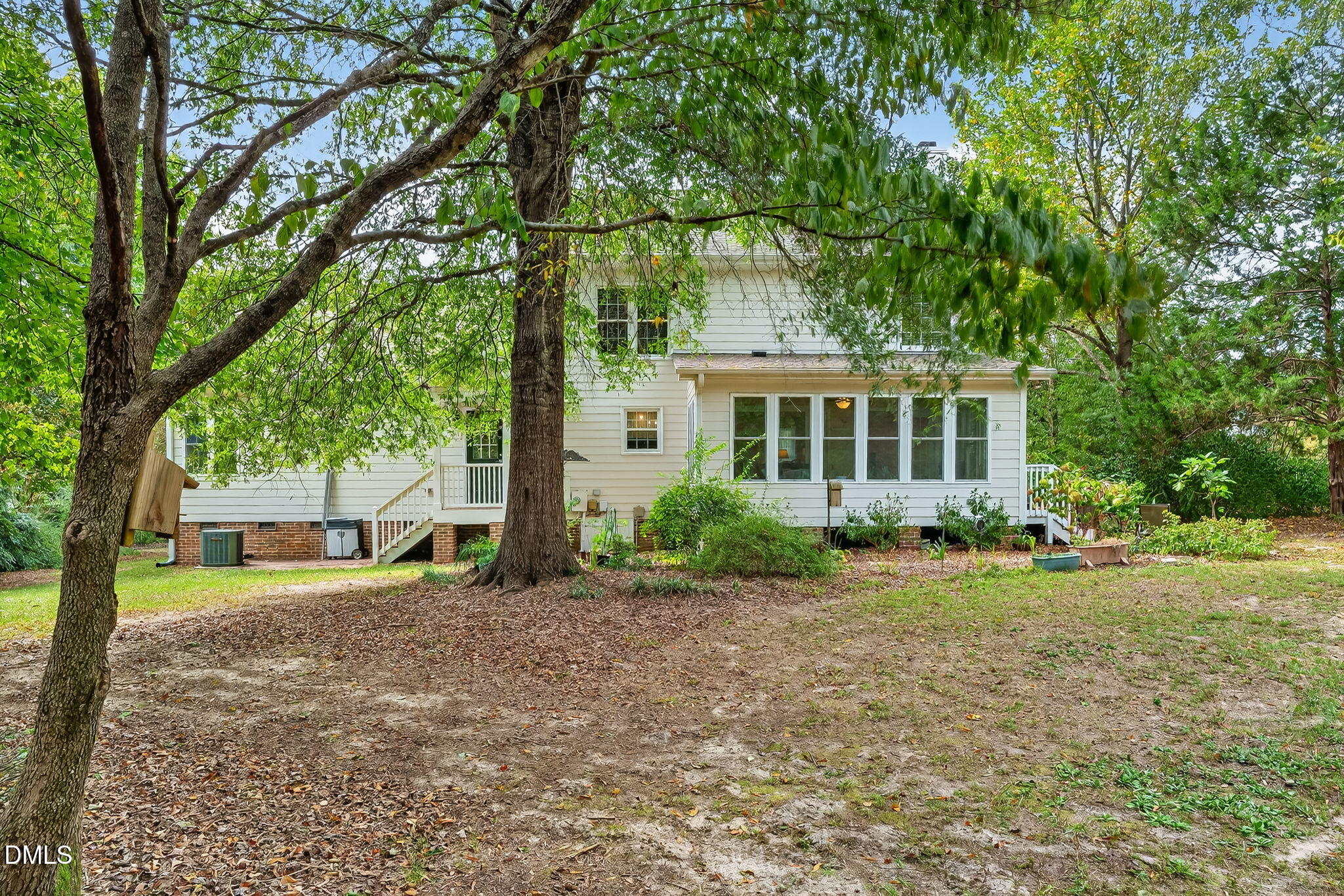 6009 Swales Way Raleigh, NC 27603 - Photo 53 of 59 a view of a house with a yard