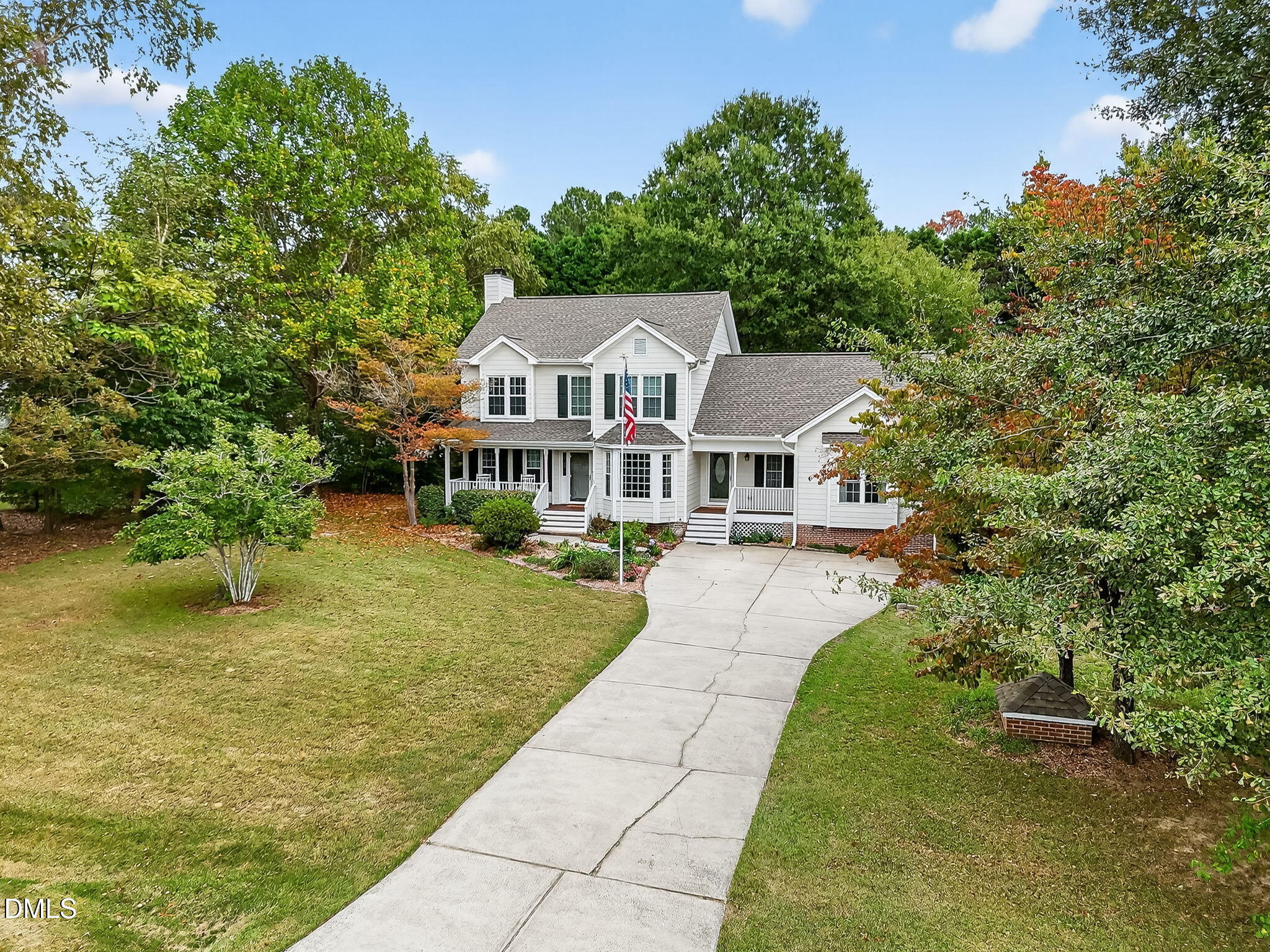 6009 Swales Way Raleigh, NC 27603 - Photo 55 of 59 a front view of a house with a yard