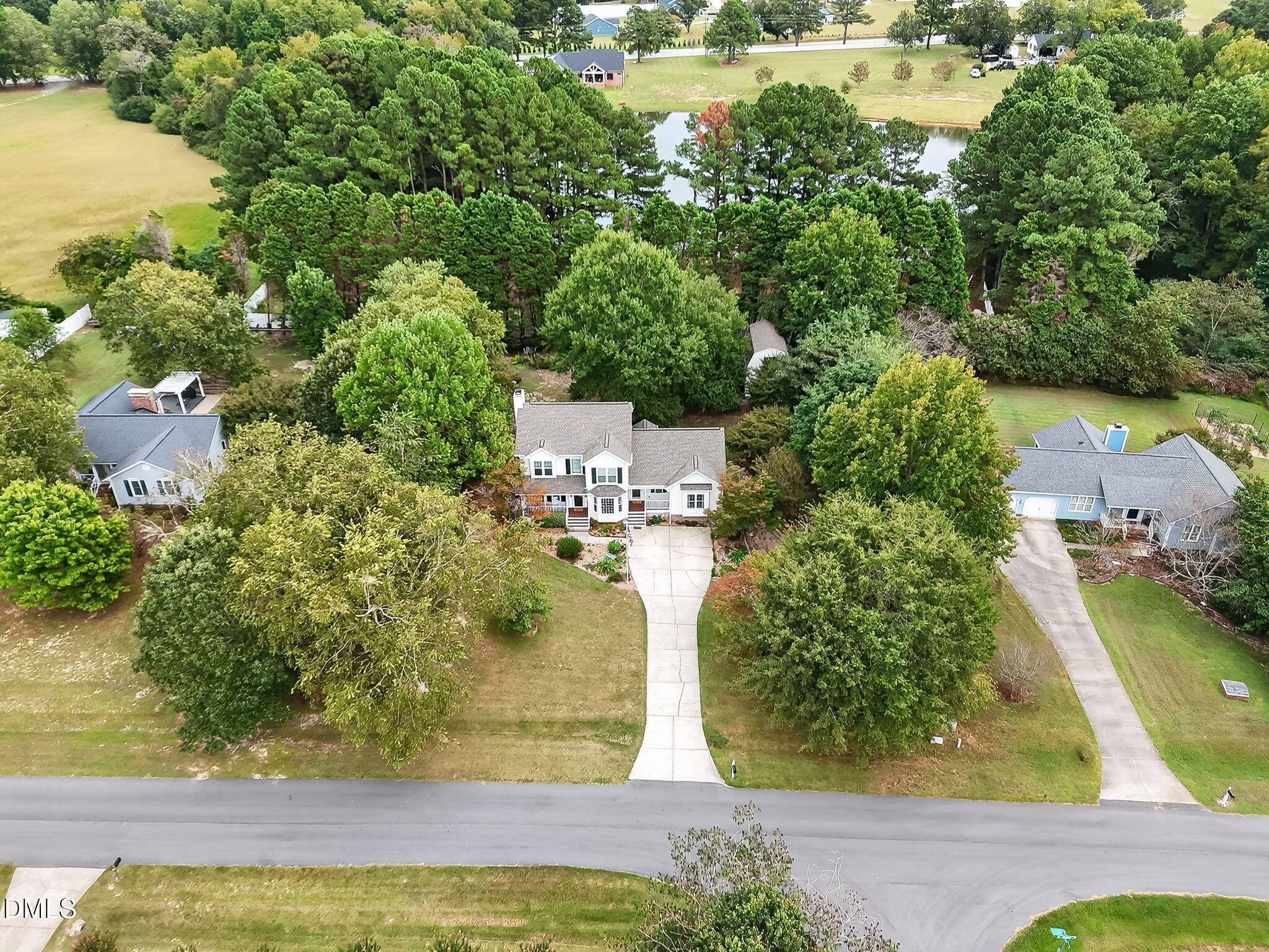 6009 Swales Way Raleigh, NC 27603 - Photo 57 of 59 an aerial view of a house with swimming pool and garden