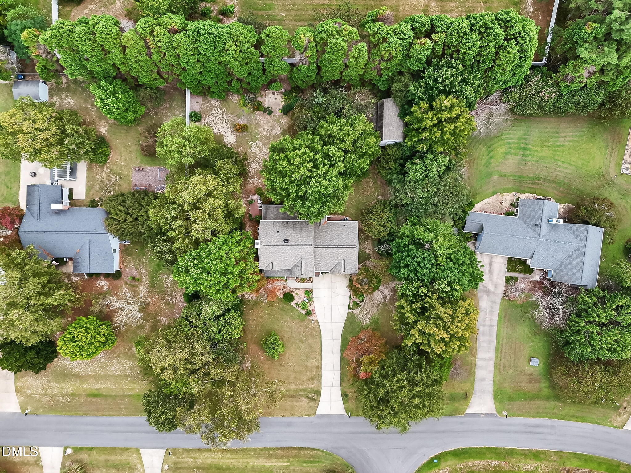 6009 Swales Way Raleigh, NC 27603 - Photo 58 of 59 an aerial view of a house with outdoor space and lake view