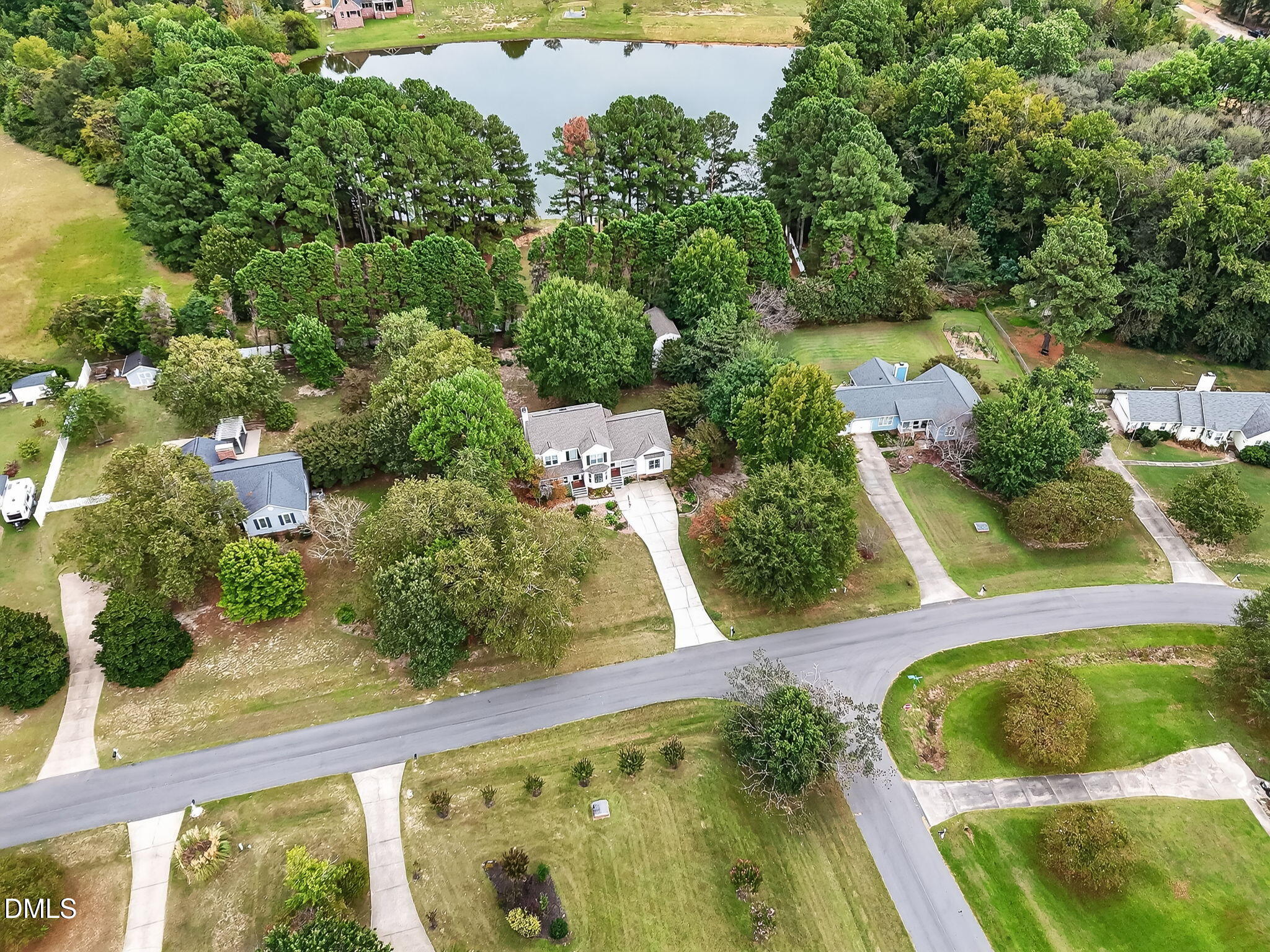 6009 Swales Way Raleigh, NC 27603 - Photo 59 of 59 an aerial view of a house having yard
