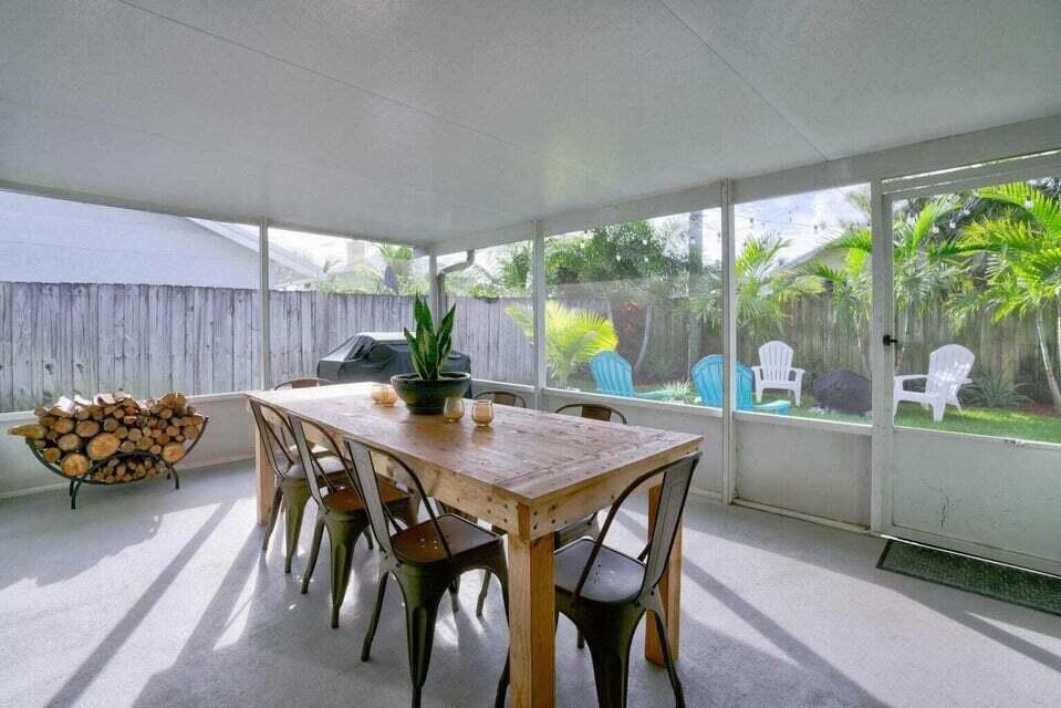 6178 Garrett Street Jupiter, FL 33458 - Photo 16 of 18 a dining room with furniture and window