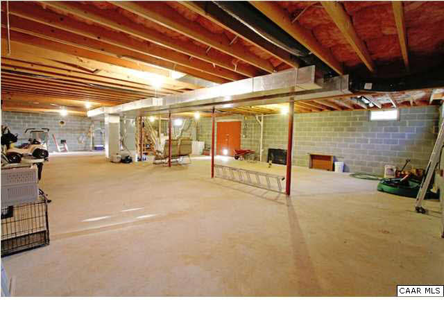 4578 Blue Run Road Somerset, VA 22972 - Photo 17 of 24 The basement is HUGE, walk-out, and plumbed for a full bathroom.