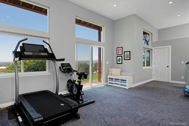 a view of a room with gym equipment