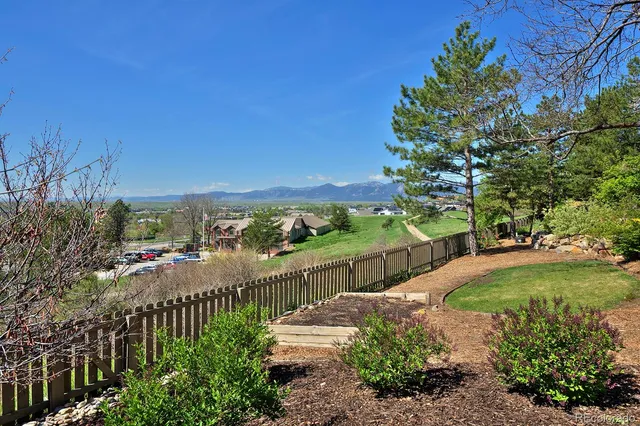 a view of a garden with an outdoor space
