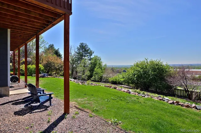 a view of a patio with a yard