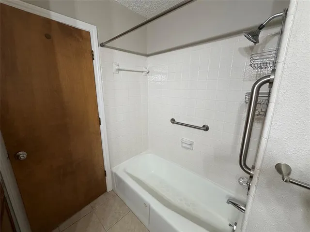 a view of room with washer and dryer