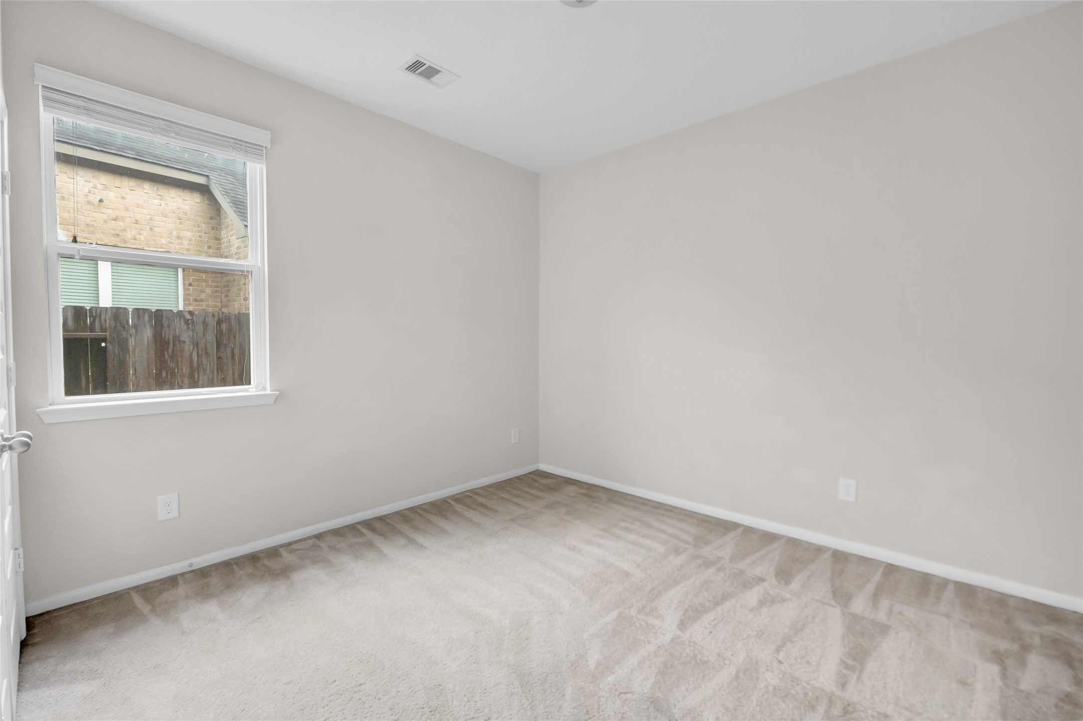 22519 Birch Ridge Meadow Drive Spring, TX 77389 - Photo 11 of 17 an empty room with a window