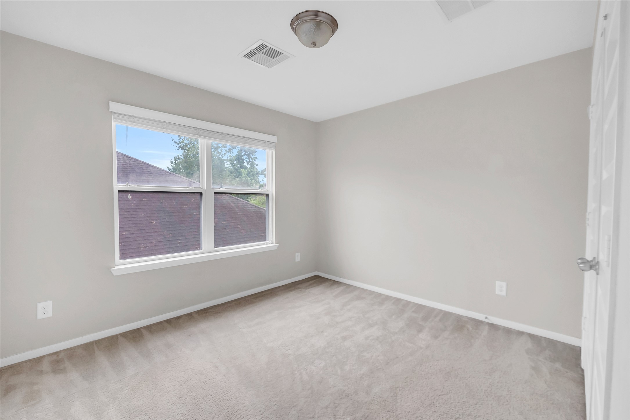 22519 Birch Ridge Meadow Drive Spring, TX 77389 - Photo 16 of 17 an empty room with a window