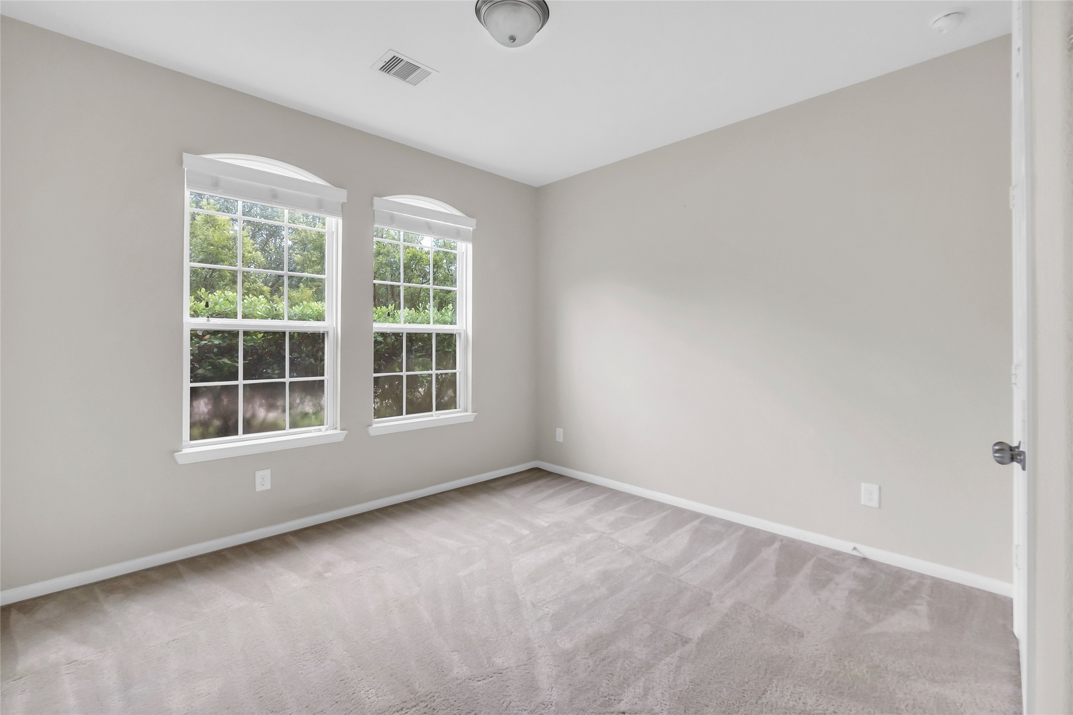 22519 Birch Ridge Meadow Drive Spring, TX 77389 - Photo 10 of 17 a view of an empty room with a window