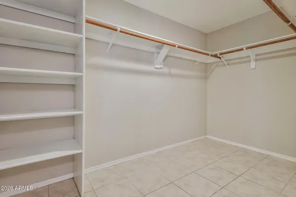 a view of an empty walk in closet