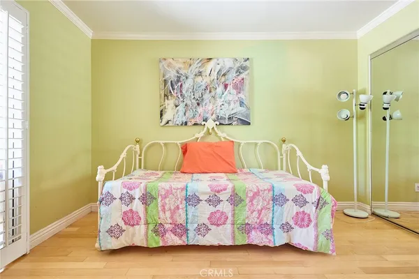 a bedroom with a bed and a table