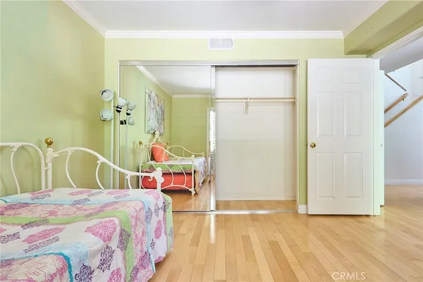 a view of entryway with wooden floor and door
