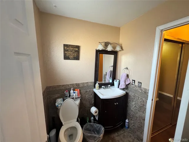 a livingroom with toys and a couch