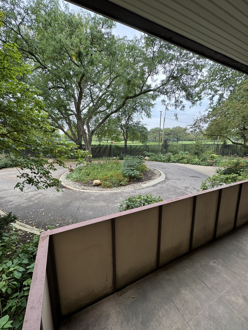 9244 Gross Point Road, Unit 103 Skokie, IL 60077 - Photo 26 of 28 a view of outdoor space and yard