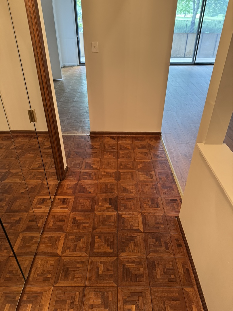 9244 Gross Point Road, Unit 103 Skokie, IL 60077 - Photo 4 of 28 a view of an empty room