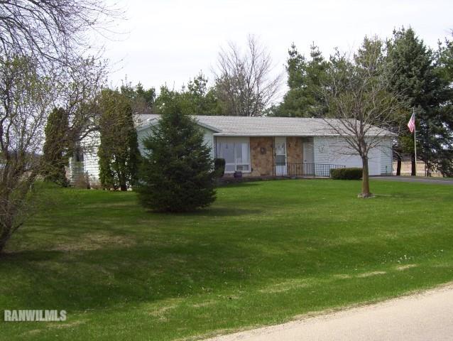 1814 North Rink Road Freeport, IL 61032 - Photo 11 of 14 a view of a house with a big yard