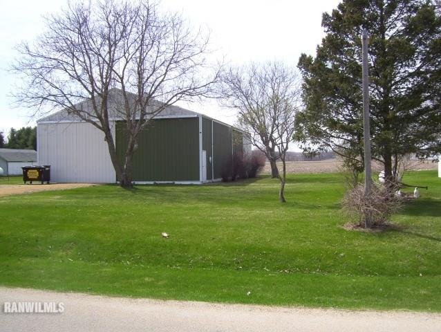 1814 North Rink Road Freeport, IL 61032 - Photo 10 of 14 a view of a backyard with large trees