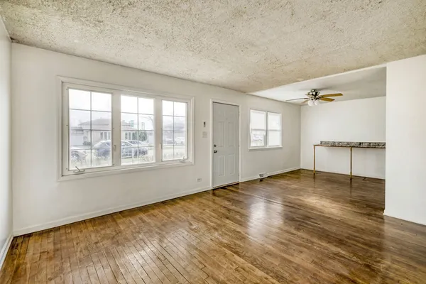 a view of an empty room and window