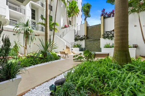an aerial view of multiple house with outdoor space