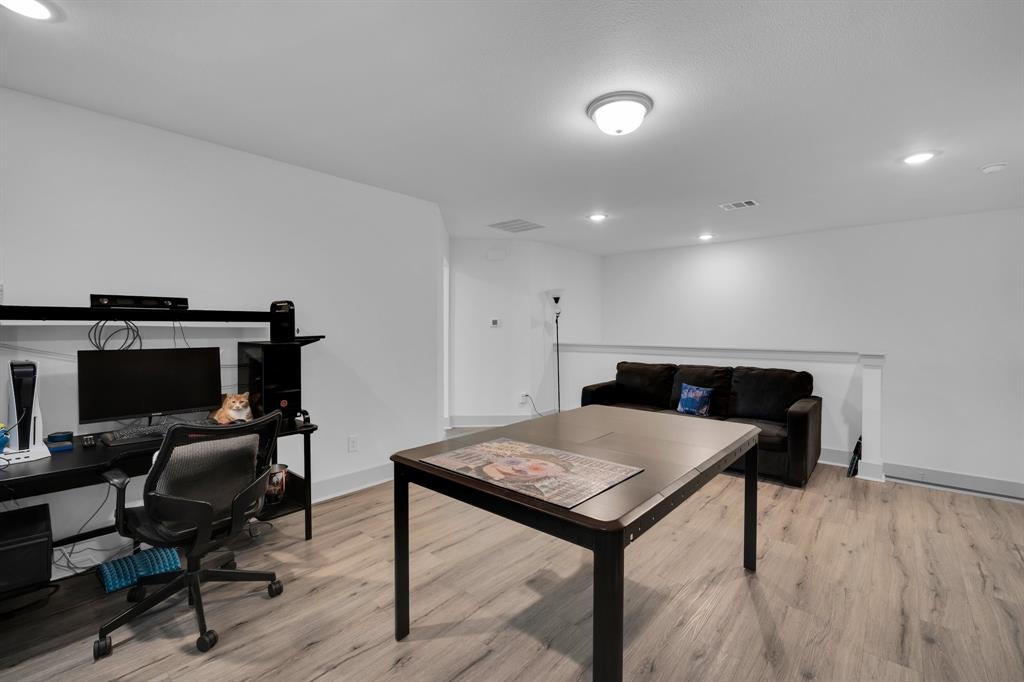 10912 Rochelle Court Grand Prairie, TX 76065 - Photo 21 of 30 a view of a workspace with furniture