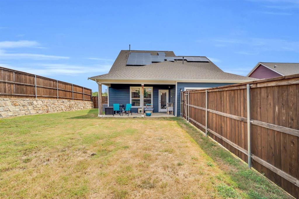 10912 Rochelle Court Grand Prairie, TX 76065 - Photo 28 of 30 a view of a house with wooden floor and fence