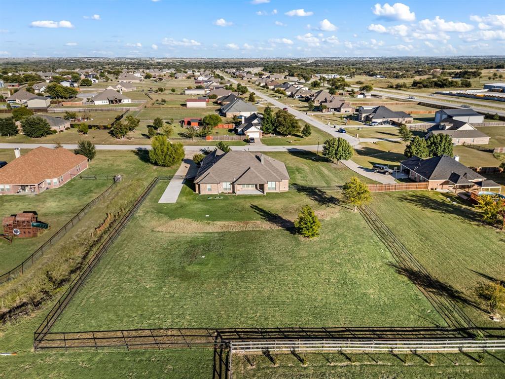 282 Heather Lane Decatur, TX 76234 - Photo 29 of 35 an aerial view of residential houses with outdoor space