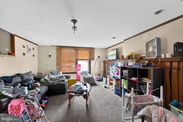 a bed room with furniture and a window