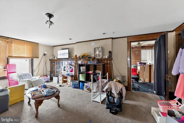 a room with furniture and gym equipment