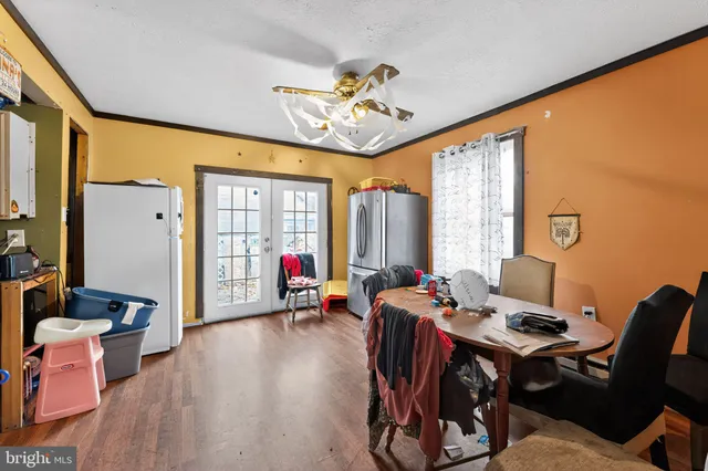 a workspace with furniture water view and a large window