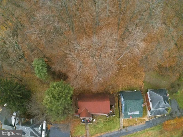 a view of swimming pool with seating area
