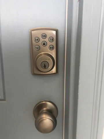 a close up of a wall with a dryer and next to it