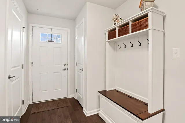 a view of front door with hallway