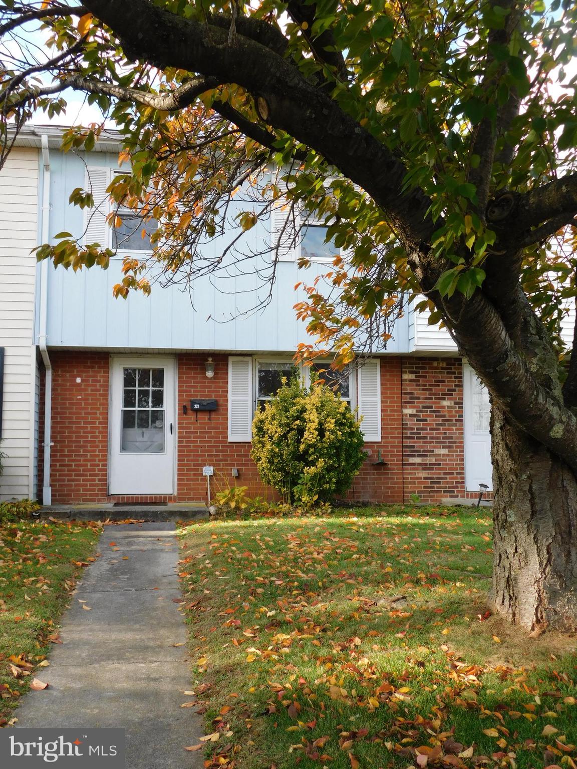 221 East Fairfax Street Berryville, VA 22611 - Photo 1 of 15 a front view of a house with a yard