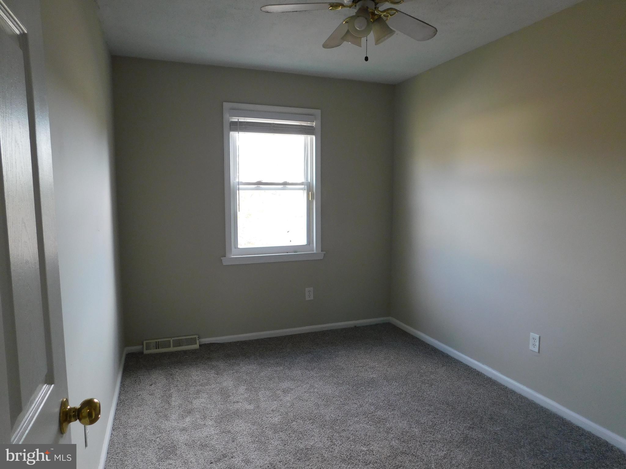 221 East Fairfax Street Berryville, VA 22611 - Photo 11 of 15 an empty room with a window