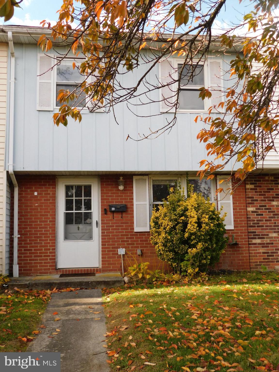 221 East Fairfax Street Berryville, VA 22611 - Photo 2 of 15 a front view of a house with garden