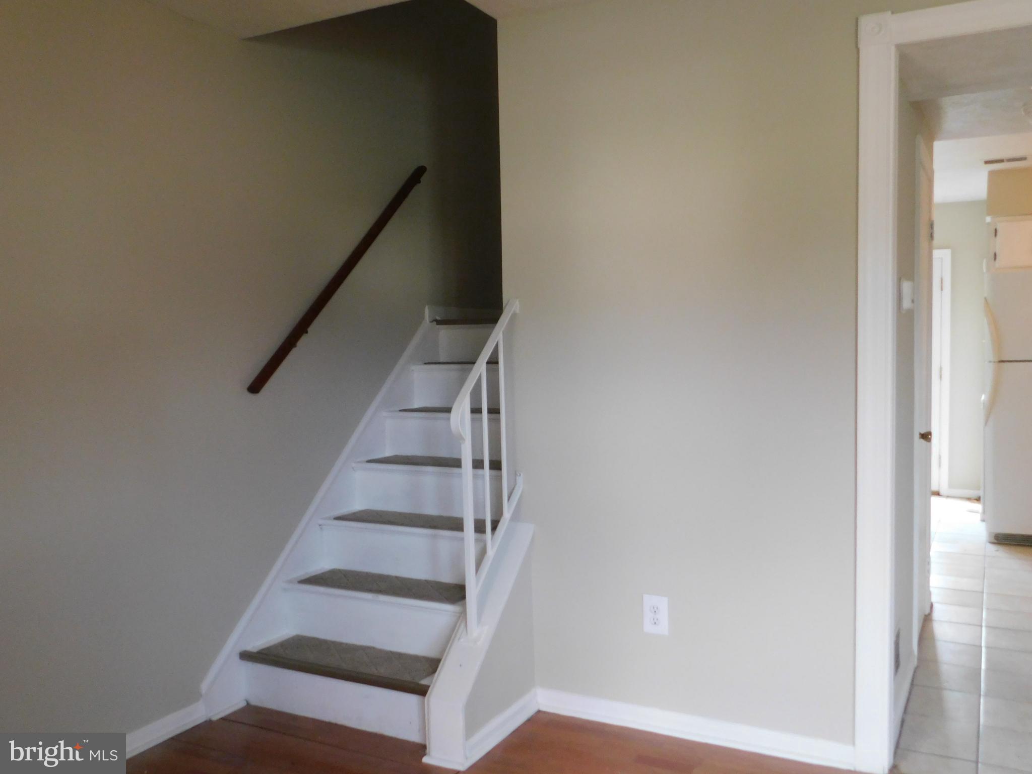 221 East Fairfax Street Berryville, VA 22611 - Photo 5 of 15 a view of entryway with wooden floor