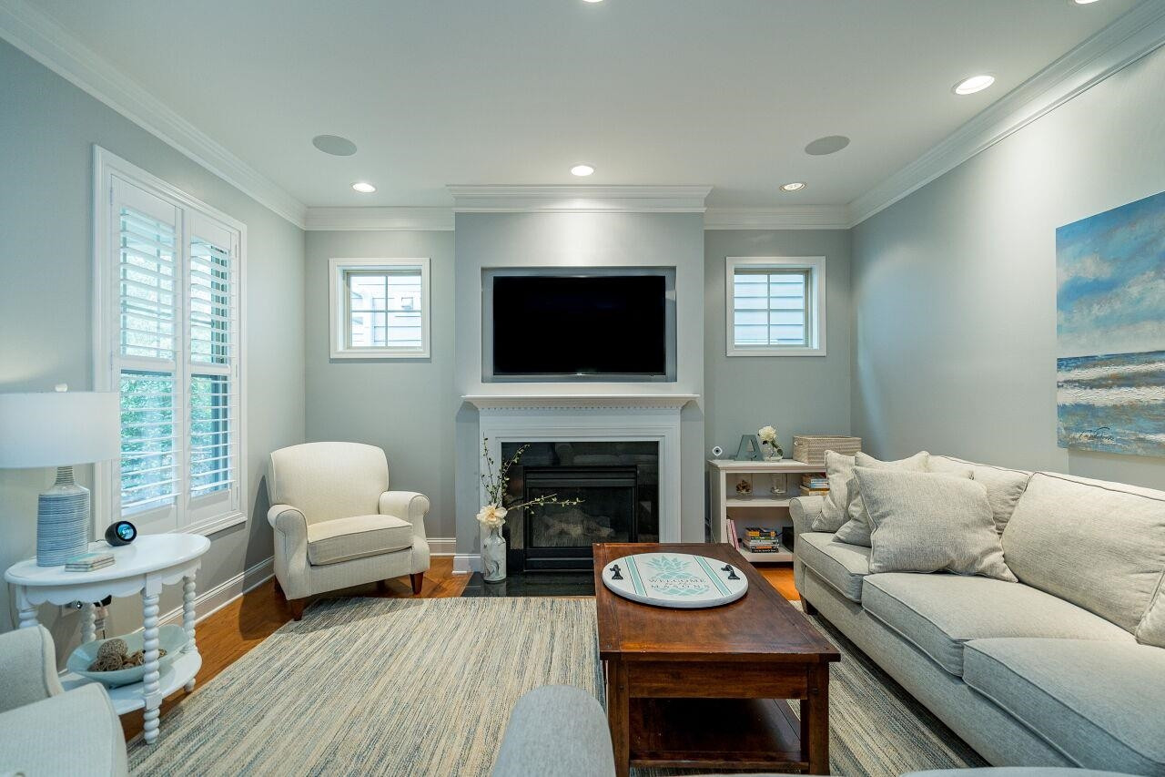 1517 Fullerton Place Raleigh, NC 27607 - Photo 7 of 30 Shutters, hardwoods, recessed lighting, surround sound speakers & fireplace make this living room easy to entertain! Living Room