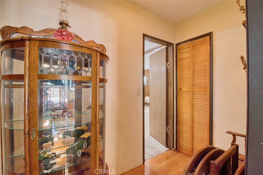 1513 Twin Lakes Road Wrightwood, CA 92397 - Photo 12 of 60 a front view of a house with a glass door