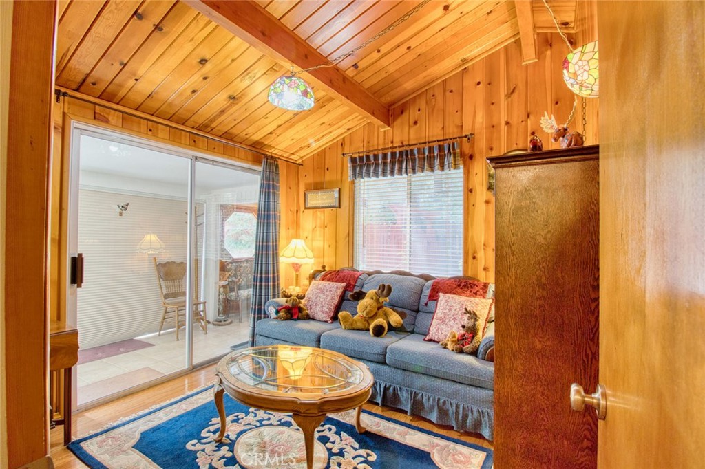 1513 Twin Lakes Road Wrightwood, CA 92397 - Photo 28 of 60 a living room with furniture and a table