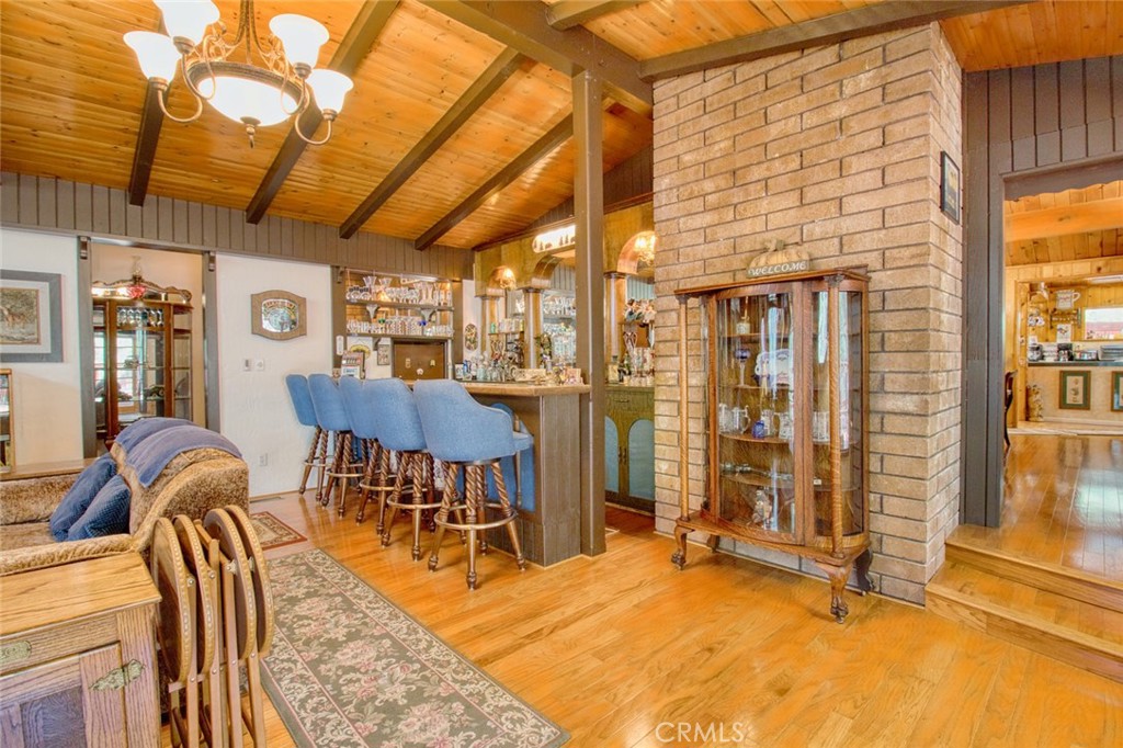 1513 Twin Lakes Road Wrightwood, CA 92397 - Photo 5 of 60 a view of a livingroom with furniture and window