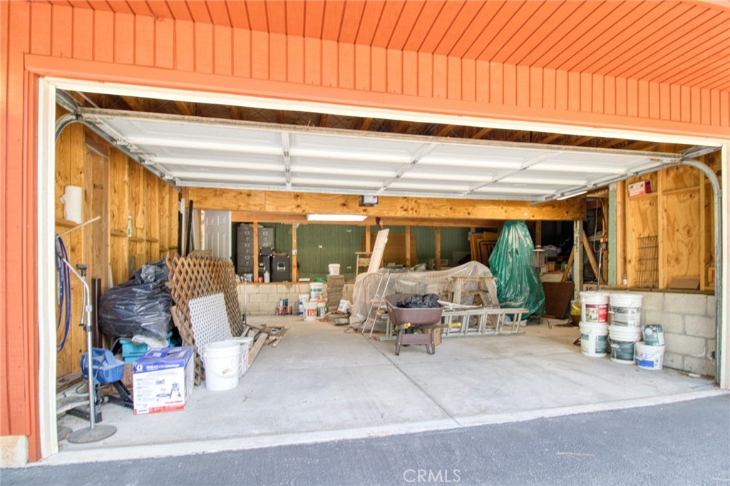 1513 Twin Lakes Road Wrightwood, CA 92397 - Photo 58 of 60 a living room with furniture and a large window