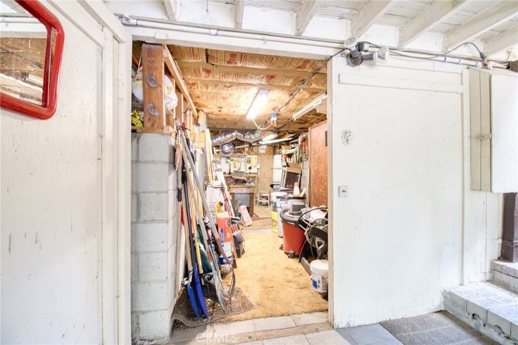 1513 Twin Lakes Road Wrightwood, CA 92397 - Photo 60 of 60 a view of walk in closet with clothes and shoes