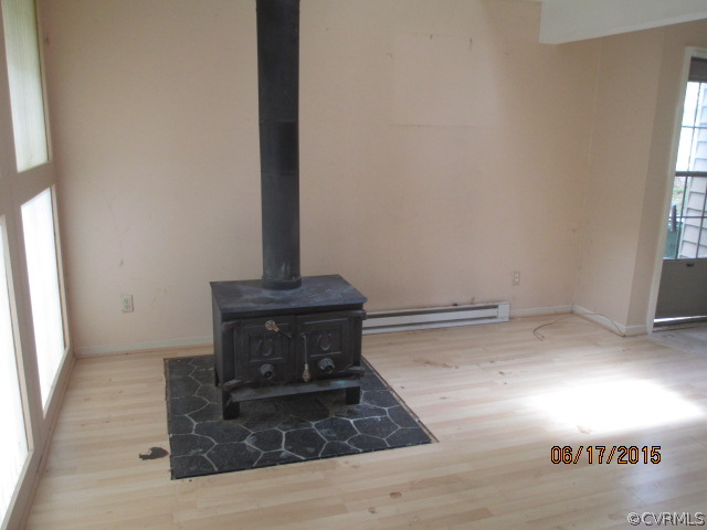 12018 Quito Road Midlothian, VA 23112 - Photo 5 of 12 a view of a fireplace in a room
