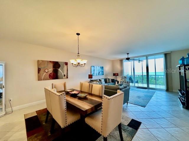 3333 Sunset Key Circle, Unit 303 Punta Gorda, FL 33955 - Photo 18 of 63 a living room with furniture and a flat screen tv