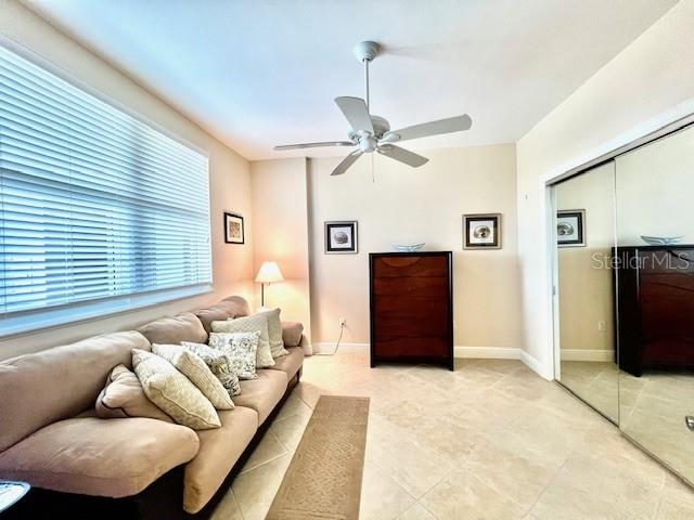 3333 Sunset Key Circle, Unit 303 Punta Gorda, FL 33955 - Photo 24 of 63 a living room with furniture and a flat screen tv