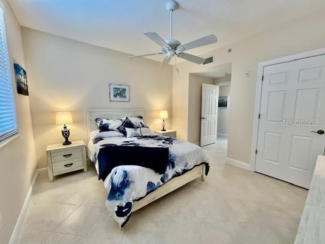 3333 Sunset Key Circle, Unit 303 Punta Gorda, FL 33955 - Photo 30 of 62 a bed room with a bed and a window