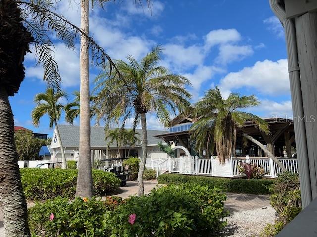 3333 Sunset Key Circle, Unit 303 Punta Gorda, FL 33955 - Photo 39 of 62 a view of outdoor space with palm trees